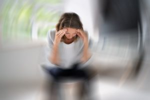 stressed woman, menopause symptoms
