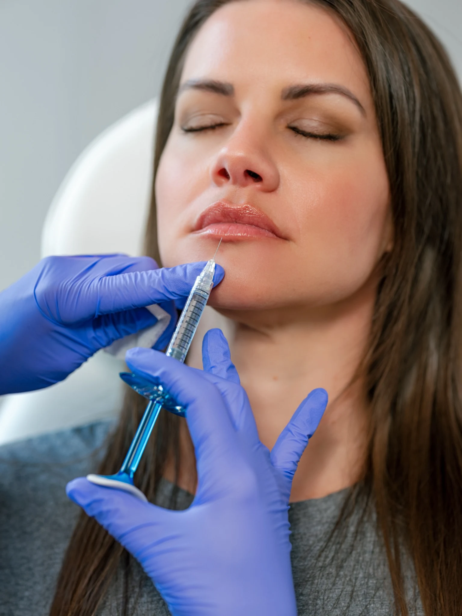 Provider performing a Swedish lip enhancement treatment during a special lip filler event at Tampa Bay Total Wellness