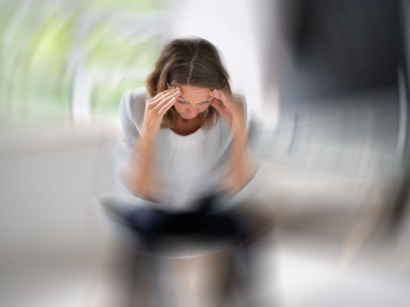 stressed woman, menopause symptoms