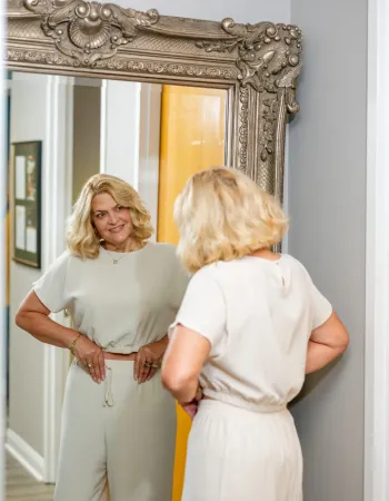 Lady looking in the mirror