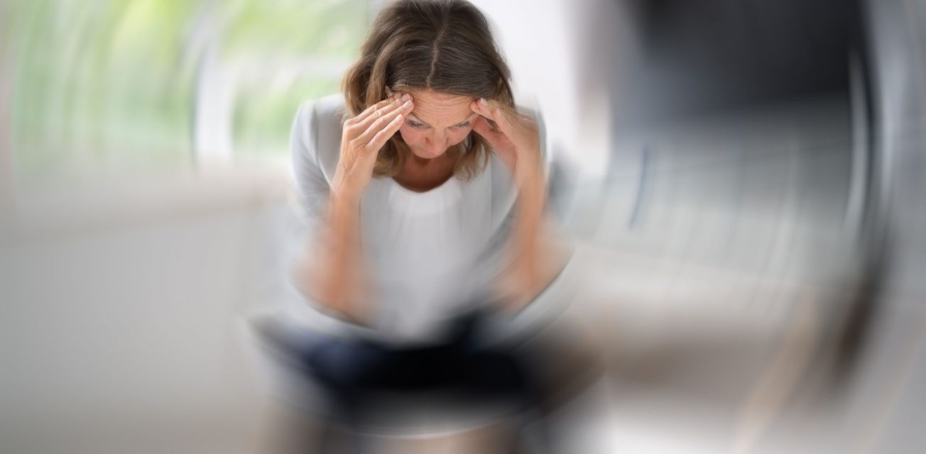 stressed woman, menopause symptoms